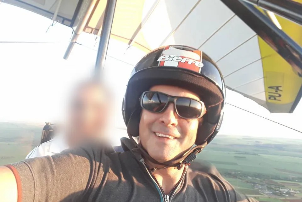 Morador de Ribeirão cai em praia de Bertioga, durante voo de paramotor